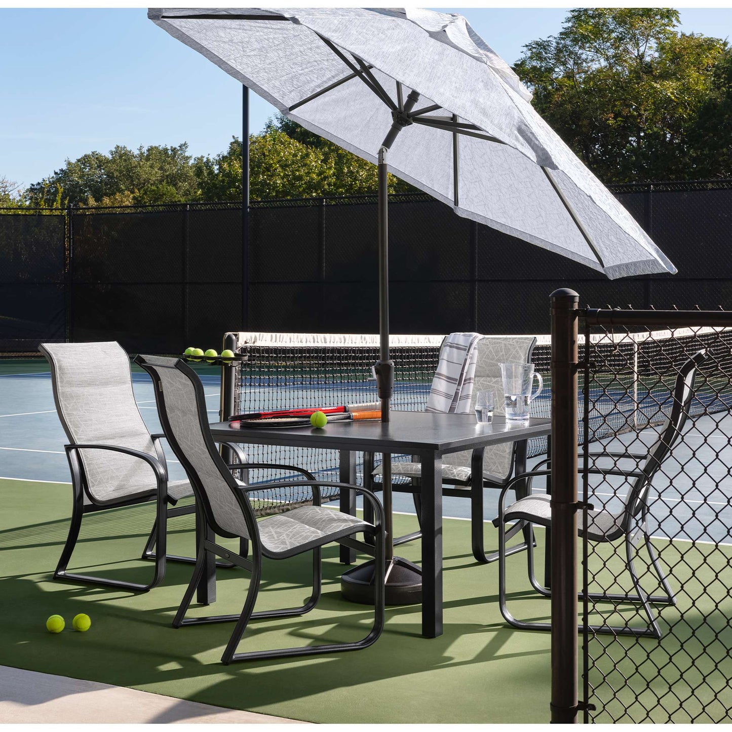 Cayman Isle Sling Padded Sling High Back Dining Arm Chair