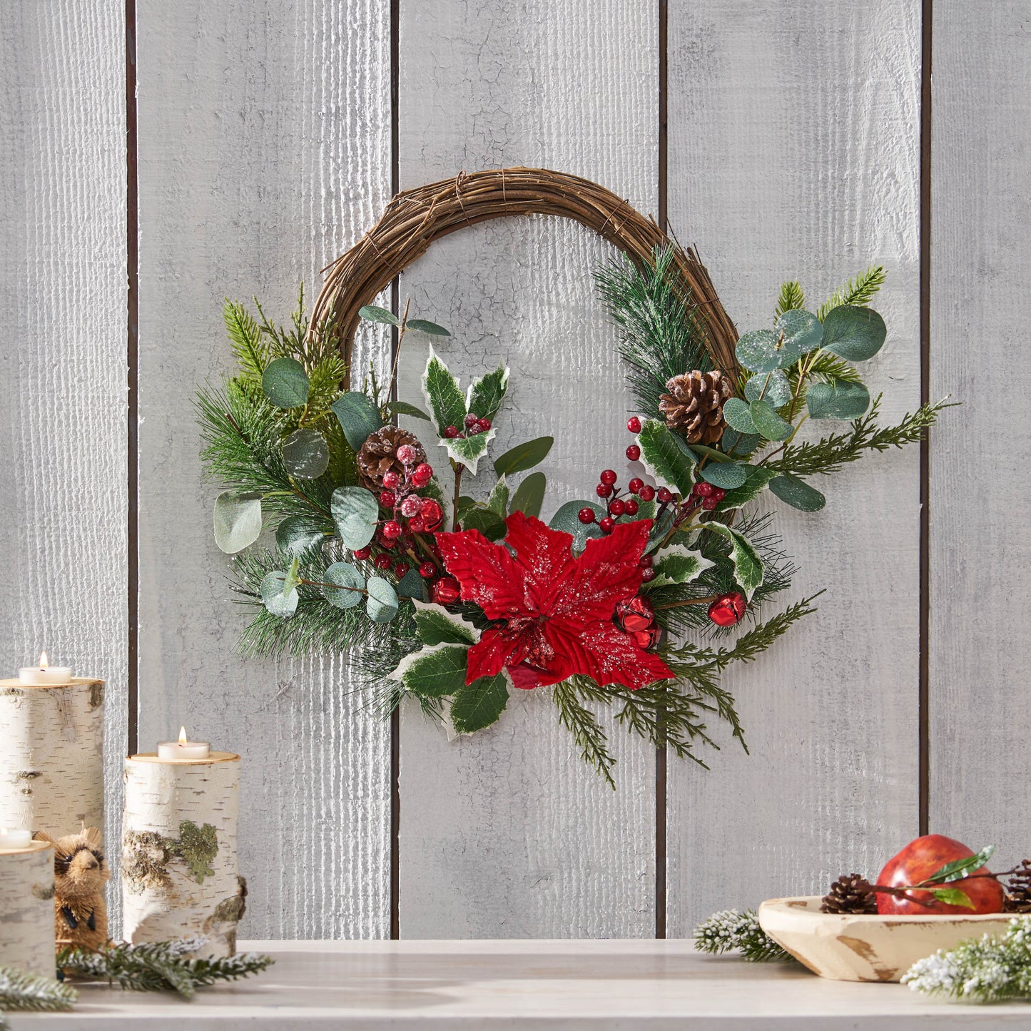 23.5" POINSETTIA/BERRY/EUCALYPTUS HALF WREATH