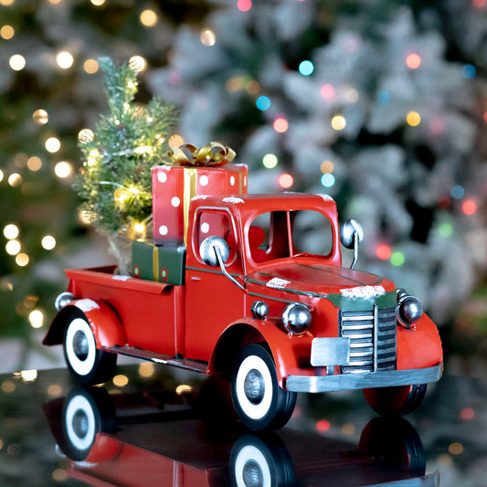 Christmas Snow Covered Pickup Truck with Lighted Christmas Tree and Gifts