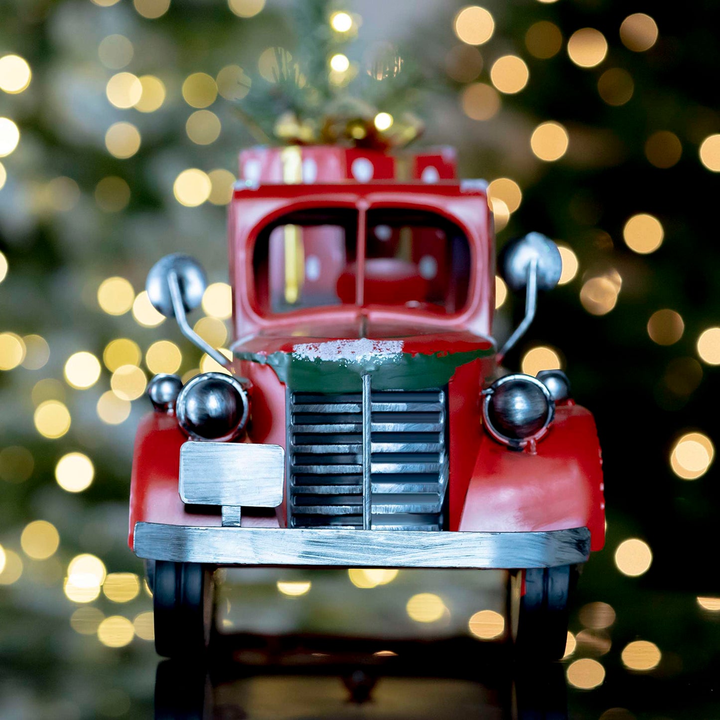 Christmas Snow Covered Pickup Truck with Lighted Christmas Tree and Gifts