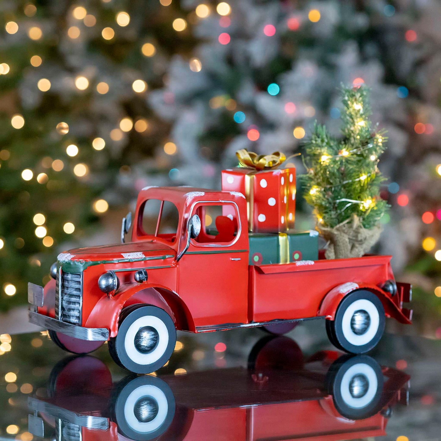 Christmas Snow Covered Pickup Truck with Lighted Christmas Tree and Gifts